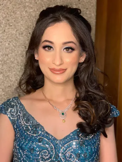 The final look is a perfect balance of classic glamour and modern color, making Rashvita stand out on her special day.