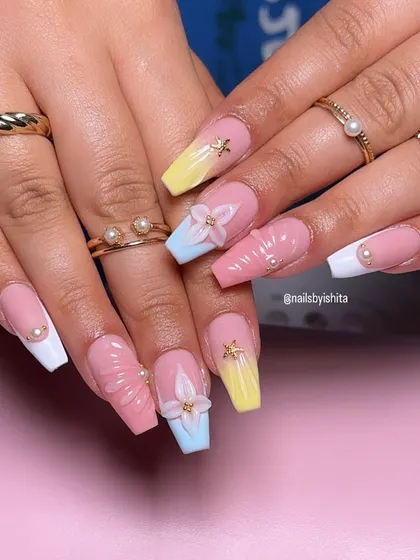 Another shot of these beautiful beach-ready nails, showing the coffin shape and delicate pearl details.