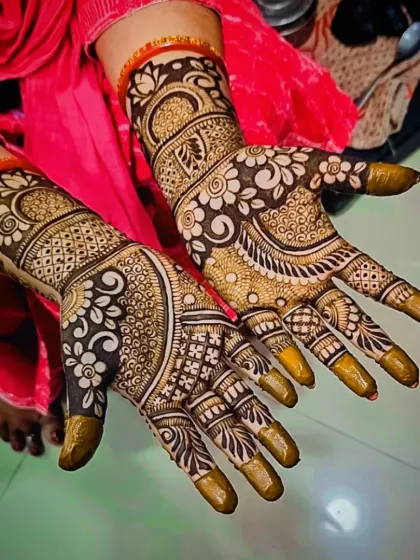 An angled shot of a floral palm design, highlighting the shading and line work.