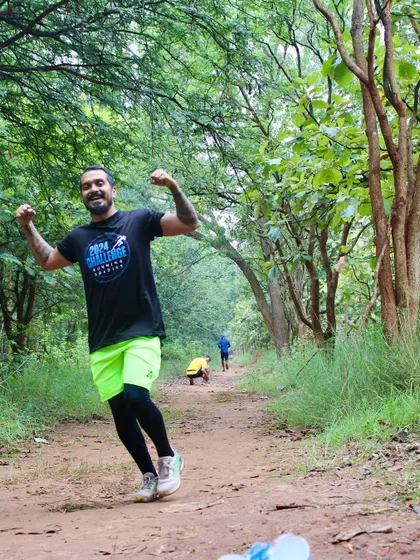 Flexing on the trail. Even after many kilometers, the energy and spirit remain high. That's the power of running with a supportive group.