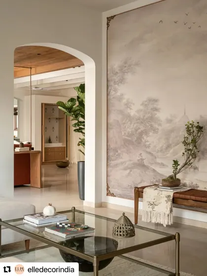 A view from the formal living room, showcasing the custom mural and the soft archway that leads into the informal living space. This is a perfect example of our layered, storytelling approach to design.