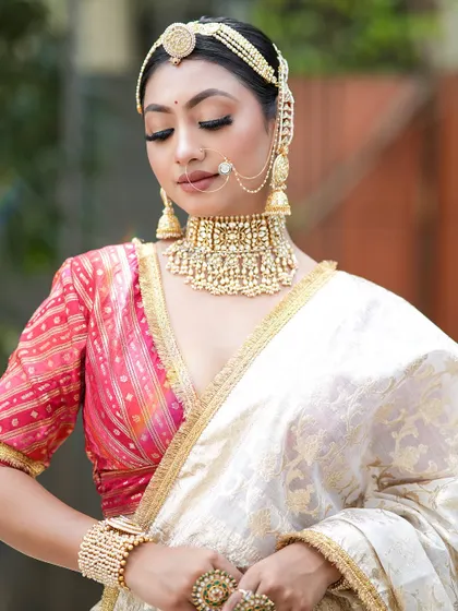 A final look at this serene and minimal bridal style. The makeup is soft and glowing, creating a look of timeless beauty.