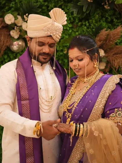 A beautiful couple moment from their wedding day. I provided subtle grooming for the groom to complement the bride's traditional Maharashtrian look.