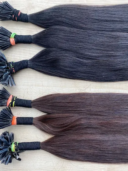 More bundles of our natural black and dark brown extensions, highlighting the rich color and healthy sheen of our 100% human hair products.