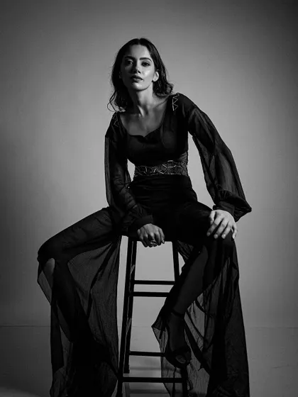 The full look, showing how the makeup works with the entire styling to create a cohesive, artistic image.