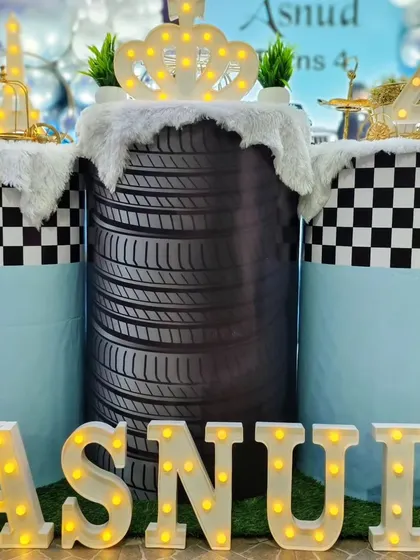 A close-up of the custom pedestals, including one made from a real tire.