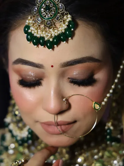 A close-up of the eye makeup from our beauty expo demo. The glossy, shimmery lids and dramatic lashes were the centerpiece of this look.