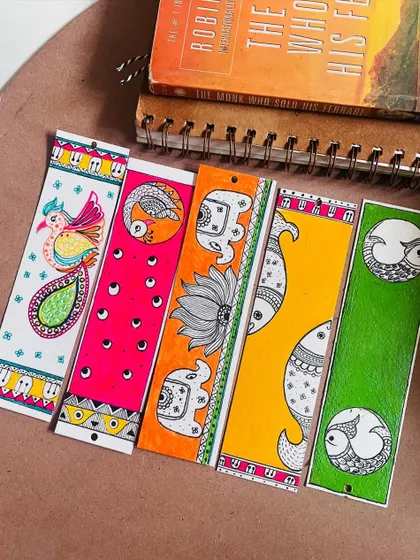 A collection of my hand-painted bookmarks featuring various Madhubani art motifs like fish, elephants, and peacocks.