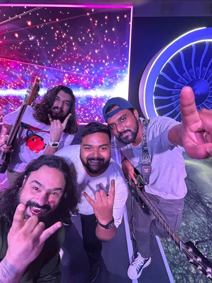 We're a team that gets things done. A selfie of the band, ready to hit the stage and give it our all.