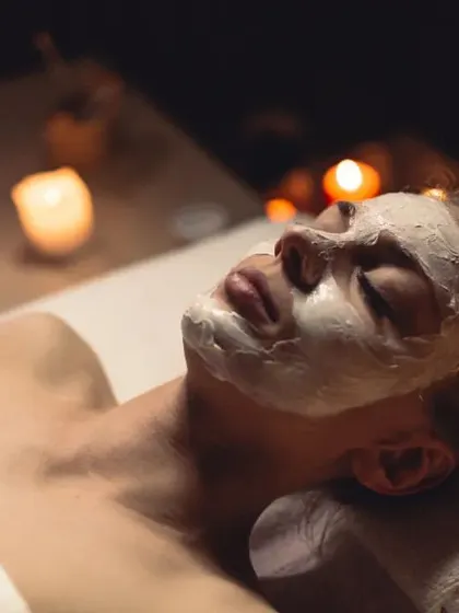 The warm, candlelit glow of our treatment rooms instantly calms the senses. This ambiance is an essential part of the healing experience we offer.