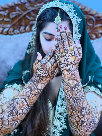 Your story, your mehndi. I love personalizing designs, like adding "Naveed ki Dulhan" for this beautiful bride, making her henna a unique reflection of her love story.
