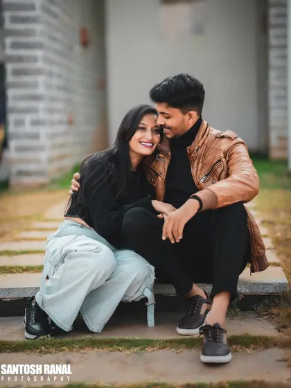 A happy and relaxed portrait of a couple enjoying their outdoor pre-wedding session.