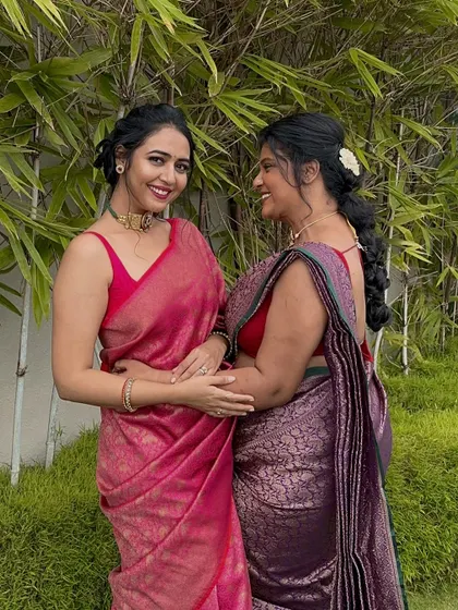 With my inspiration, Hitha Chandrashekar. For this event, I wore a rich purple Banarasi saree, a timeless choice for any formal celebration.