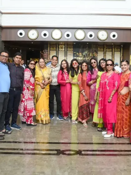 Another group photo of guests, capturing the large scale of the celebration.