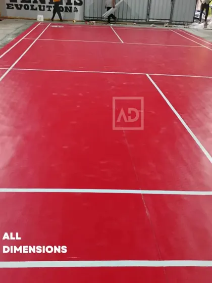 Another angle of the badminton court installation, showing the clean, sharp lines required for professional play.
