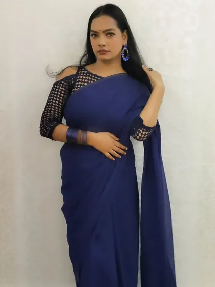 A confident and glamorous pose, perfect for a party or special event.