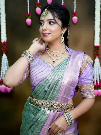 A graceful pose that captures the elegance of the bride and her chosen jewellery.