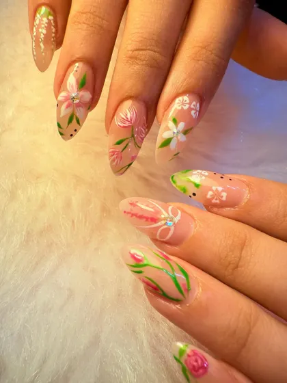 She's the kind of girl who is the bouquet. This beautiful set features delicate, hand-painted pink and white flowers on a sheer nude base, creating a soft and feminine look.