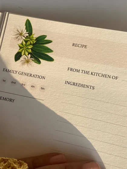 Preserving your family recipes is an act of love. This close-up shows the thoughtful details in our journal, from the generation markers to the space for memories, all framed by a delicate illustration of star anise.