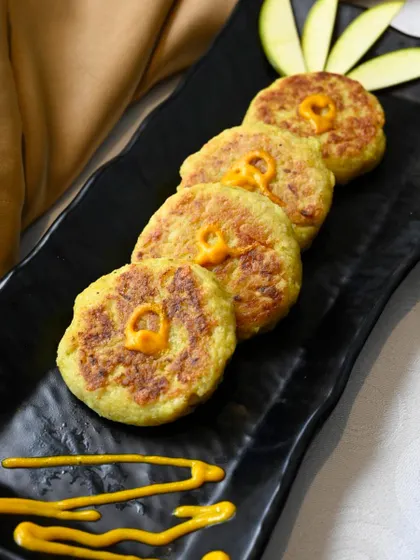 From my Mango Special Menu, indulge in the sweet and tangy delight of Khatti Mithi Tikki.