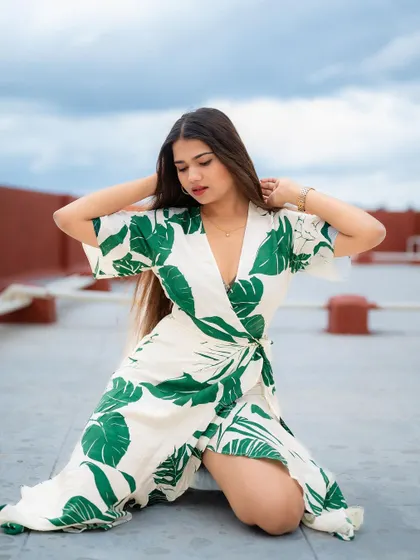 A duplicate of image 428, this rooftop portrait with a beautiful sky as the backdrop is dramatic and stylish.