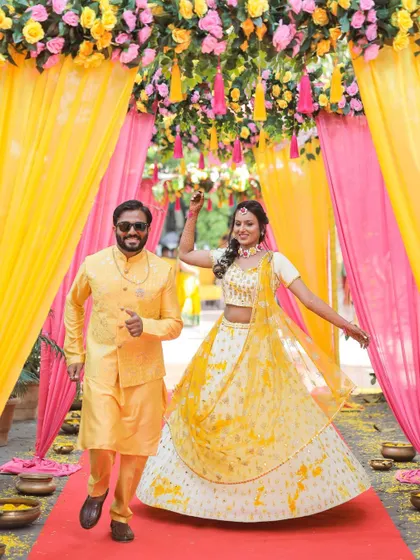 A grand entrance for the Haldi ceremony! This couple's energy is infectious, and we made sure to capture their joyful entry.