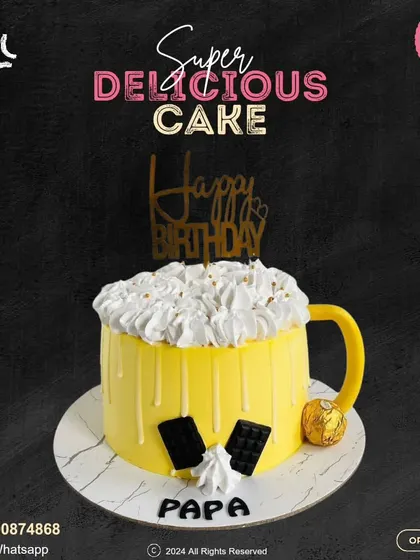 Cheers to Papa! This fun beer mug cake is the perfect way to celebrate a dad's birthday. It's topped with frothy "foam" buttercream and comes with a side of chocolate and a Ferrero Rocher.