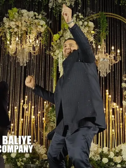 This groomsman is living his best life on stage. My goal is to make everyone feel like a star, and his energy is proof of that.