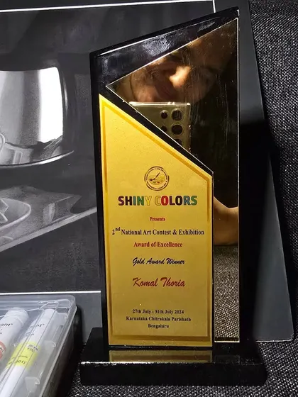 My Gold Award trophy from the Shiny Colors National Art Contest for my still life drawing.
