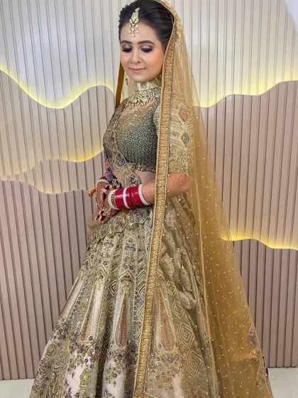 A full-length shot of the bride, looking graceful and elegant.