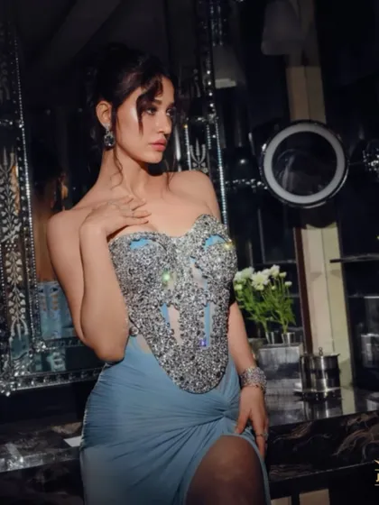 The stunning Disha Patani adds a sparkle to her look with our beautiful gemstone earrings and diamond bracelet.