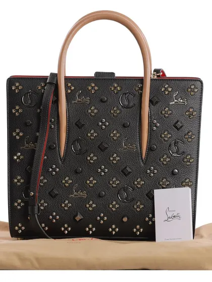 The complete set for a luxury handbag, including the dust bag and card, instilling confidence and showing authenticity for e-commerce.