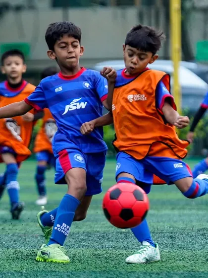 Intense action from the JSW Youth League as two U9 players battle for possession. Competitive fixtures are a key part of our development program.