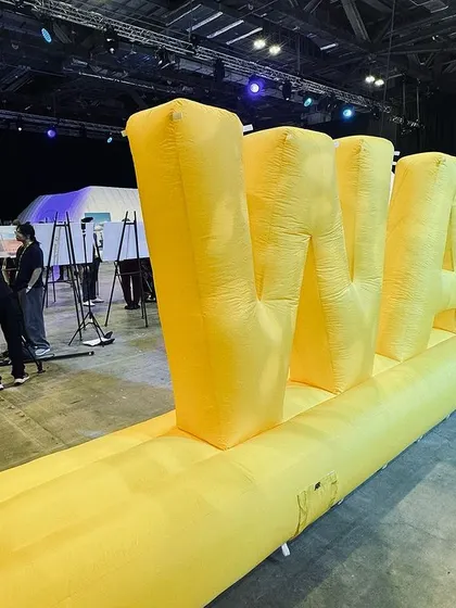 The inflatable "WAF" letters at the entrance to the festival.