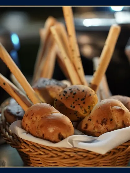 A basket of freshly baked bread and breadsticks. This simple but essential part of the buffet is presented beautifully, showing that we care about every single detail of the meal.