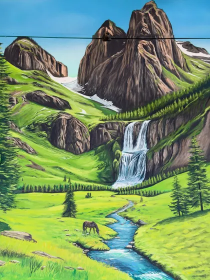 The finished mountain landscape mural, seen here without any obstructions. The goal was to create a piece of art that you can get lost in, offering a view of a world beyond the room.