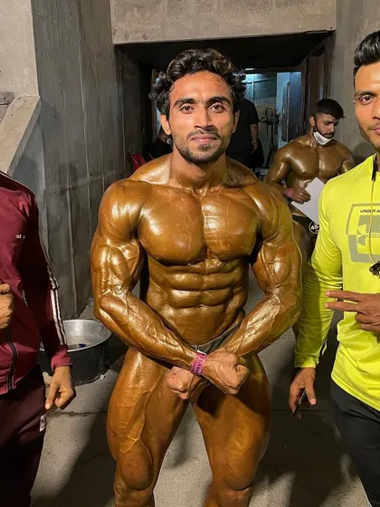 Posing with a client after his win.