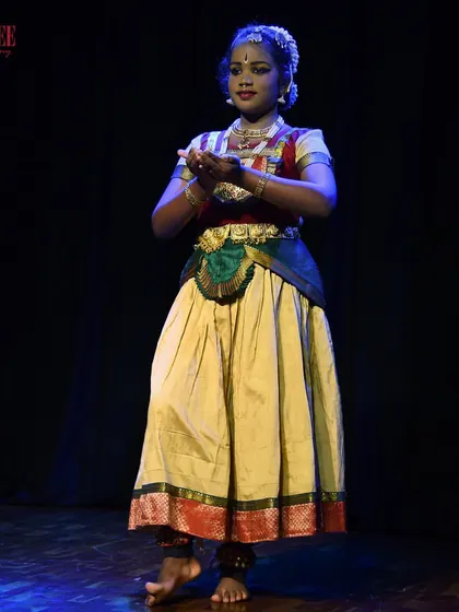 One of our dedicated students from the Bharatanatyam batch, performing with grace and focus at the Nritya Sanje showcase.