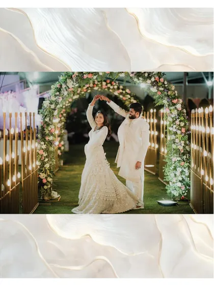 A dreamy dance under a floral archway. This shot of Adarsh and Premika captures the romance and elegance of their reception night.