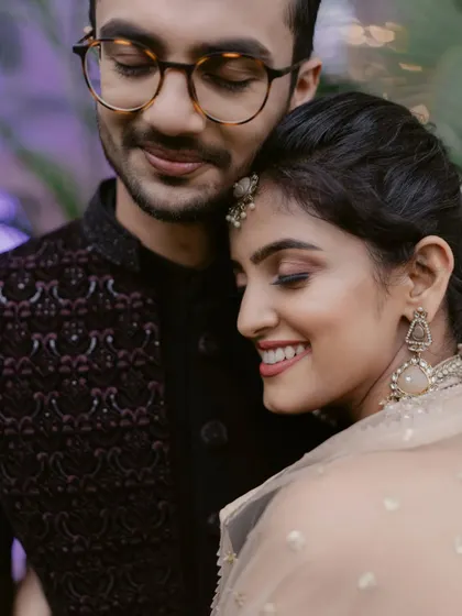 An intimate moment with her partner. The makeup looks soft and beautiful even in close-up, candid shots.