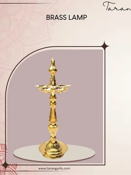 This classic five-wick brass lamp (Kuthu Vilakku) is an essential part of any pooja room. Its simple, elegant design has been a staple in South Indian homes for generations, symbolizing the dispelling of darkness and ignorance.