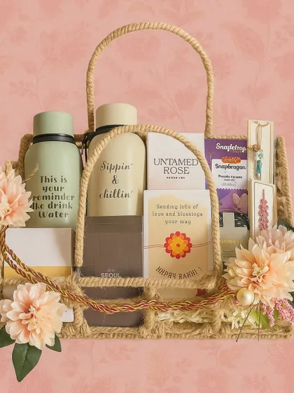 A beautiful Rakhi basket for the best Bhaiya and Bhabhi. It includes matching "Sippin' & Chillin'" bottles, Zara perfumes, a reed diffuser, cookies, and a lovely couple rakhi set.