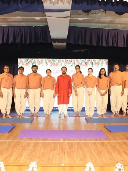 A group photo with the talented students who performed the Bhagavatam-inspired yogasana demonstration. Their collaborative effort and dedication were truly inspiring to witness.