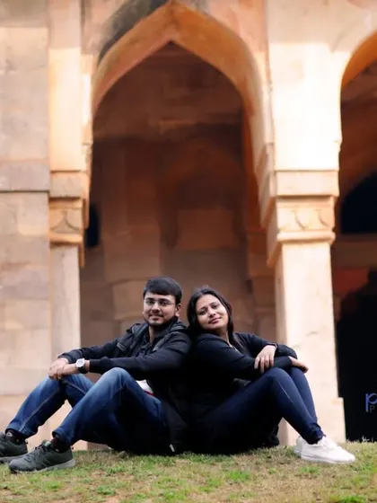 Using the iconic arches of Lodhi Garden as a backdrop for a casual pre-wedding photo. This shot shows how we can blend historical architecture with modern, relaxed couple poses.