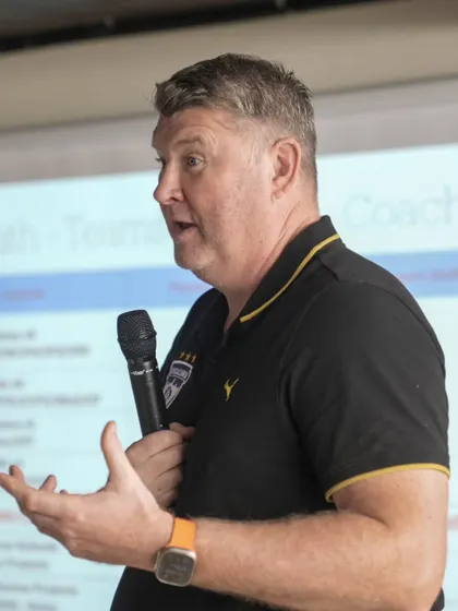 Head of Youth Development Jason Withe addresses parents and coaches at the Young Blues Elite orientation, emphasizing our collaborative approach.