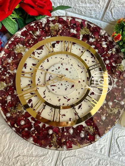 For this 12-inch clock, I used red rose petals from a wedding varmala, setting them against a creamy white base. The golden clock dial adds a touch of warmth and elegance.
