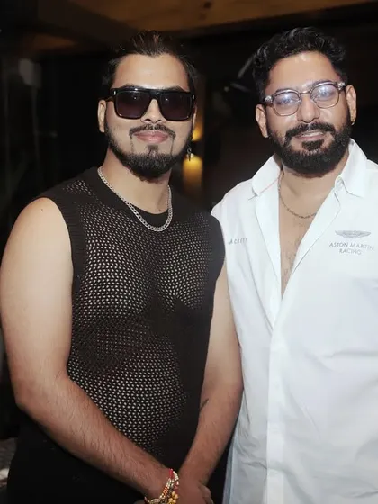 A surreal moment for me, standing with the legendary actor Devaraj and his son, Prajwal Devaraj, after performing at their private event. It is a dream come true to meet and perform for the stars I have admired on screen.