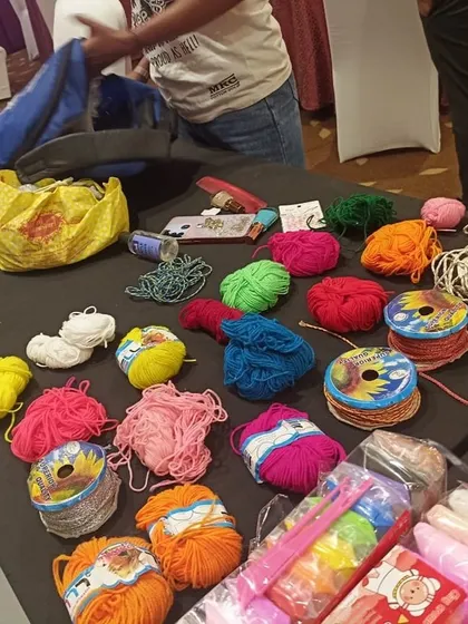 A glimpse of the supplies for our arts and crafts corner. I bring a variety of materials like colorful yarn, beads, and paper for kids to create their own masterpieces.