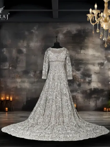 A full view of the Gray Net Tail Gown, showcasing its beautiful tail and delicate floral designs.