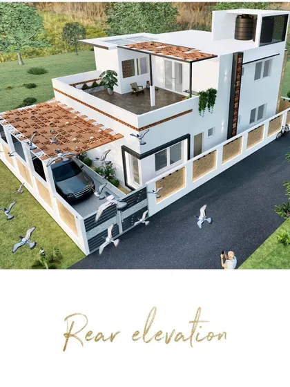 The rear elevation of a residence that blends classic charm with contemporary style. The design incorporates a spacious upper terrace and traditional Mangalore tile roofing, creating a private oasis that feels both timeless and modern.